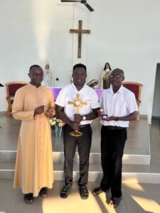 The seminary school in Ghana, Africa received the monstrance in November. Here, members of the seminary school pose with the monstrance after it was delivered. 