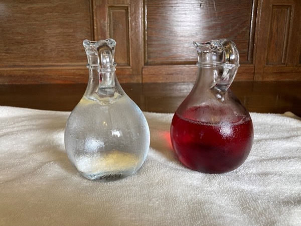 The cruets – These glass vessels, commonly in the shape of small pitchers or vases, hold the wine and water and are used before the consecration.