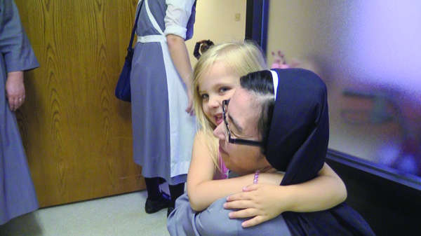Sister Max hug