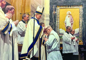 Father Hyland Smith is ordained by Bishop Thomas John Paprocki at the Cathedral of the Immaculate Conception in Springfield in 2013.