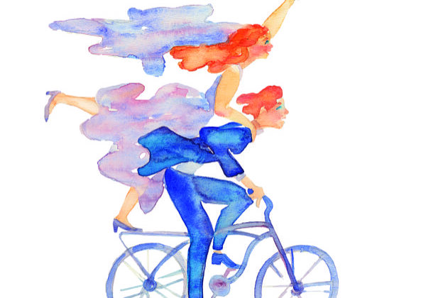 Just married happy couple bride and groom riding bicycle with flower bouquet