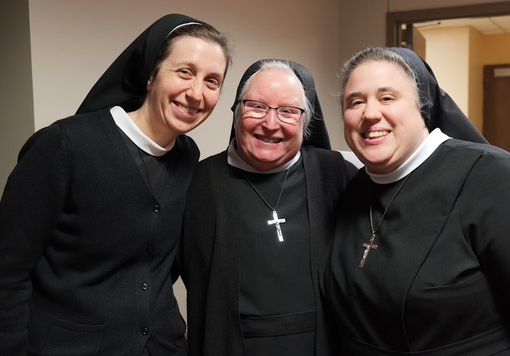 Sister Rose Thomas Weighner, Sister M. Theresita Hearon, and Sister M. Clementia Toalson enjoy a sisterly encounter during the centennial celebration of their American province.

<br><em>
Photo by Sister M. Consolata Crews, FSGM
</em>